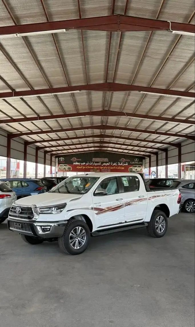 New Toyota Hilux VIII Facelift, 2.7 l, 2026 in Saudi Arabia, Medina by Zahrat Al Eis شركة زهرة العيص للسيارات, White color. GCC Specs | AUTO.AE | Listing #268043