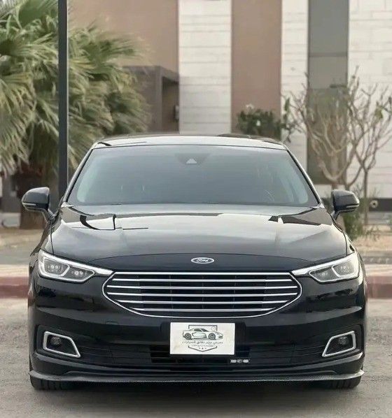 Подержанный Ford Taurus VII (CD4), 2.0 л, 2022 в Саудовская Аравия, Эр-Рияд от First Top One Cars معرض فيرست توب ون للسيارات Черный цвет.  | AUTO.AE | Объявление #261156
