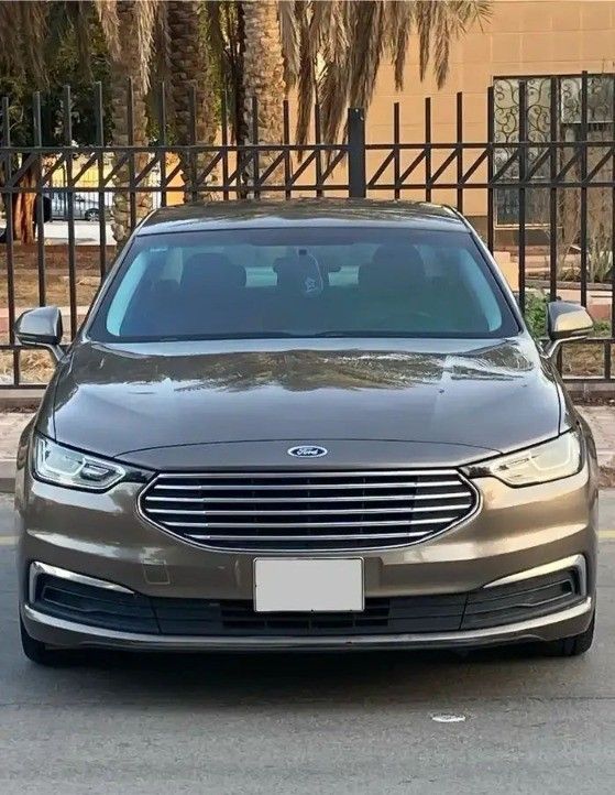 Подержанный Ford Taurus VII (CD4), 2.0 л, 2020 в Саудовская Аравия, Эр-Рияд от Bayraq Al Ibda’a Cars معرض بيرق الابداع Серый цвет.  | AUTO.AE | Объявление #261376