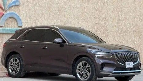 Used Genesis GV70 I, 2.5 l, 2023 in Saudi Arabia, Riyadh by Barakat Al Markabat Cars معرض بركة المركبات للسيارات, Brown color. GCC Specs | AUTO.AE | Listing #260567