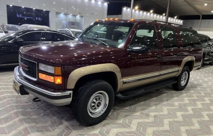 Used ⁦GMC Suburban, 5.7 l, 1999⁩ in Saudi Arabia, Riyadh by Fakhamat Najd معرض فخامة نجد للسيارات, Red color. Other | AUTO.AE | Listing #288752