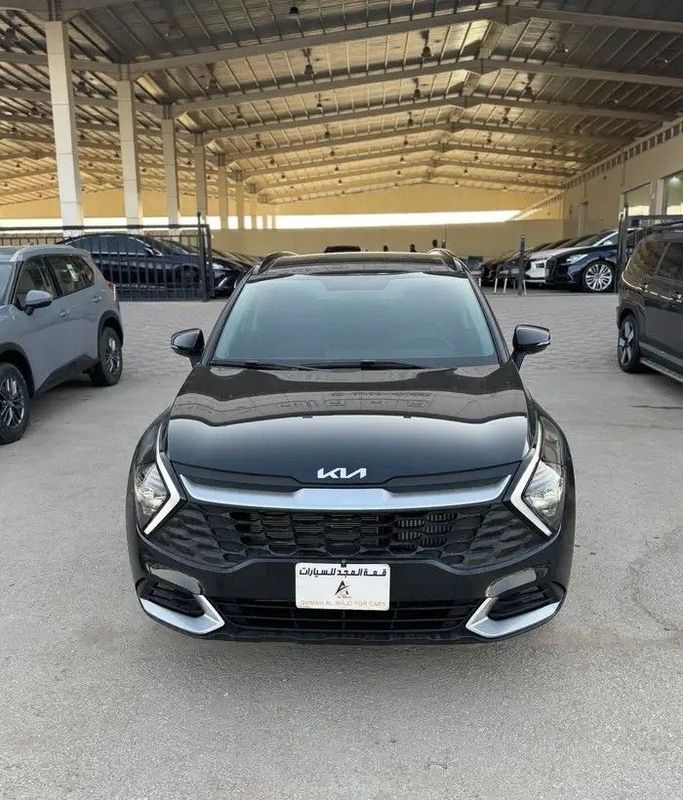 Used Kia Sportage V, 2.5 l, 2023 in Saudi Arabia, Riyadh by Qimmat Al Majd  معرض قمة المجد للسيارات, Black color.  | AUTO.AE | Listing #251881
