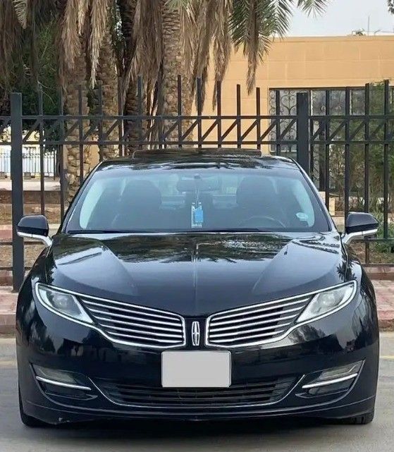 Подержанный Lincoln MKZ II, 3.7 л, 2014 в Саудовская Аравия, Эр-Рияд от Bayraq Al Ibda’a Cars معرض بيرق الابداع Черный цвет.  | AUTO.AE | Объявление #261499