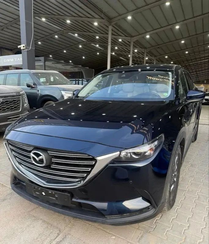 Used Mazda CX-9 II Facelift, 2.5 l, 2024 in Saudi Arabia, Riyadh by Fahad Salman & Ali Al Omair شركة فهد سلمان وعلي العمير للسيارات, Navy Blue color. GCC Specs | AUTO.AE | Listing #257257