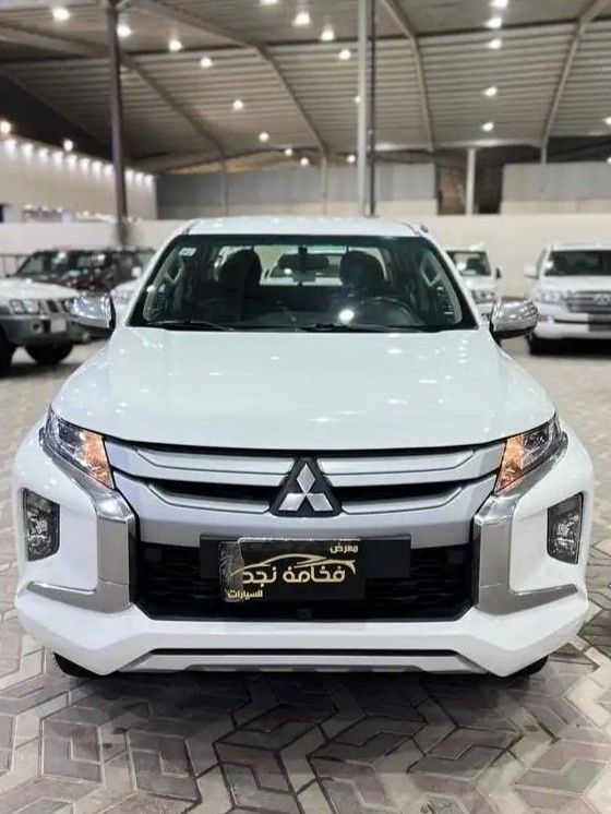 Used ⁦Mitsubishi L200 V Facelift, 2.4 l, 2022⁩ in Saudi Arabia, Riyadh by Fakhamat Najd معرض فخامة نجد للسيارات, White color. Other | AUTO.AE | Listing #288735