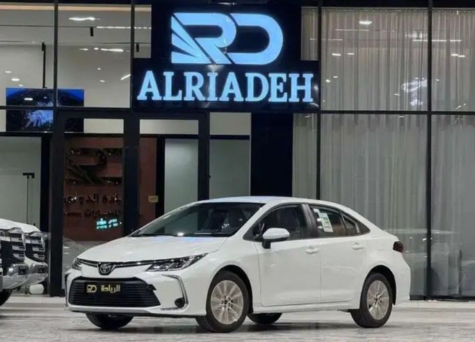 Новый Toyota Corolla Sporty XII (E210), 2.0 л, 2026 в Саудовская Аравия, Эр-Рияд от Al Riyada Al Duwalya شركة الريادة الدولي للسيارات Белый цвет.  | AUTO.AE | Объявление #261757