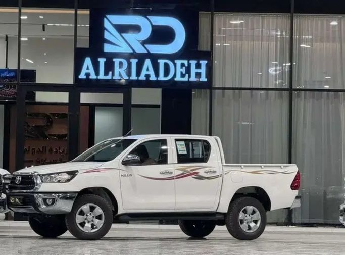 New Toyota Hilux VIII, 2.4 l, 2026 in Saudi Arabia, Riyadh by Al Riyada Al Duwalya شركة الريادة الدولي للسيارات, White color.  | AUTO.AE | Listing #262292