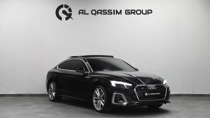 Подержанный Audi A5 45 TFSI II (F5) Рестайлинг, 2.0 л, 2023 в Шардже от Al Qassem Cars Trading Черный цвет. Корейская | AUTO.AE