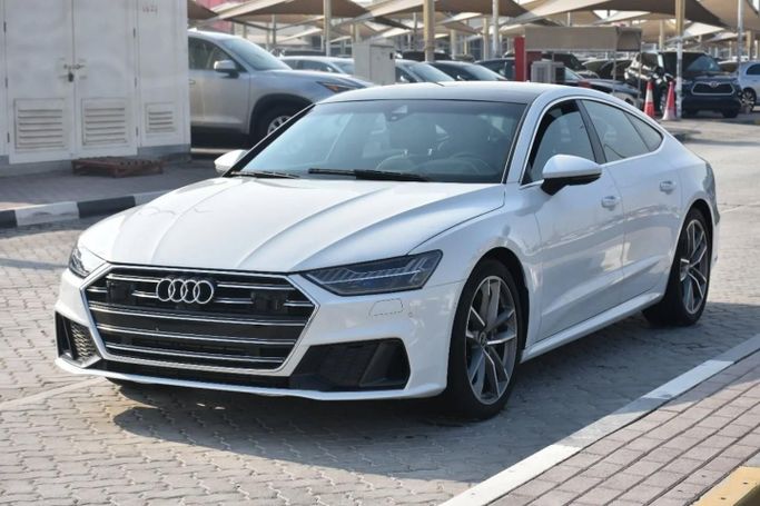 Подержанный Audi A7 55 TFSI II (4K), 3.0 л, 2021 в Шардже от Alfaris Used Cars Белый цвет. Other | AUTO.AE
