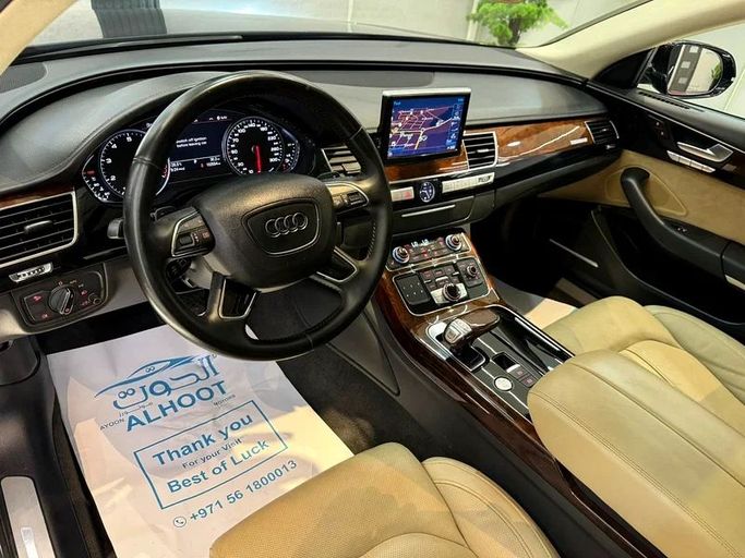 Подержанный Audi A8 L 60 TFSI III (D4) Рестайлинг, 4.0 л, 2014 в Шардже от Ayoon Alhoot Motors Тёмно-синий цвет. GCC | AUTO.AE