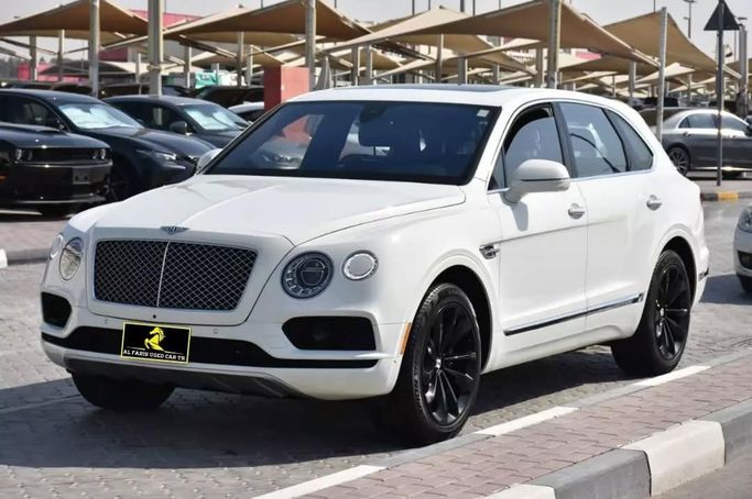 Подержанный Bentley Bentayga I, 6.0 л, 2018 в Шардже от Alfaris Used Cars Белый цвет. Other | AUTO.AE