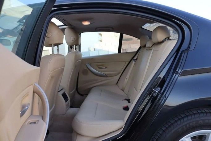 Used BMW 3 Series 318i VI (F3x) Facelift, 1.5 l, 2018 in Sharjah by Al Sayed Khamis Used Cars, Black color. GCC Specs | AUTO.AE