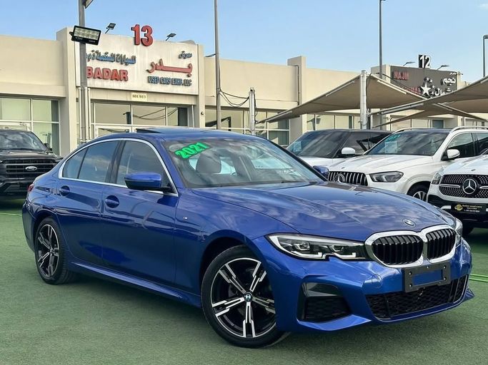 Used BMW 3 Series 320i VII (G2x), 2.0 l, 2021 in Sharjah by Badar Used Cars, Navy Blue color.  | AUTO.AE