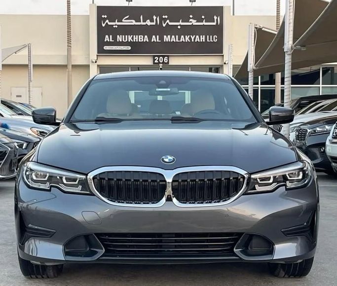 Used BMW 3 Series 330i xDrive VII (G2x), 2.0 l, 2021 in Sharjah by Al Nukhba Al Malakyah Used Cars, Grey color. American Specs | AUTO.AE