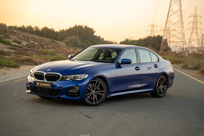 مستعملة BMW 3 Series 330i سابعاً (G2x), 2.0 l, 2021 في في الشارقة من Al Marid Motors، اللون أزرق.  | AUTO.AE | إعلان #273111