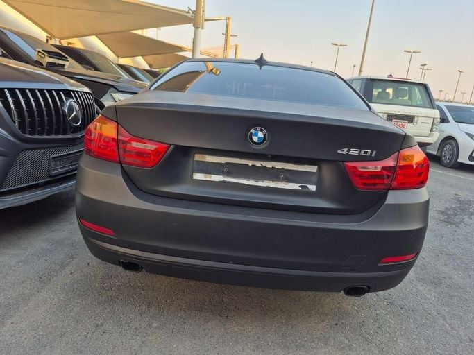 Подержанный BMW 4 Series 420i F32/F33/F36, 2.0 л, 2015 в Шардже от Al Sada used cars Черный цвет. GCC | AUTO.AE