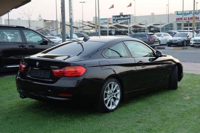 Подержанный BMW 4 Series 428i F32/F33/F36, 2.0 л, 2014 в Шардже от OMC Used Cars Черный цвет. GCC | AUTO.AE
