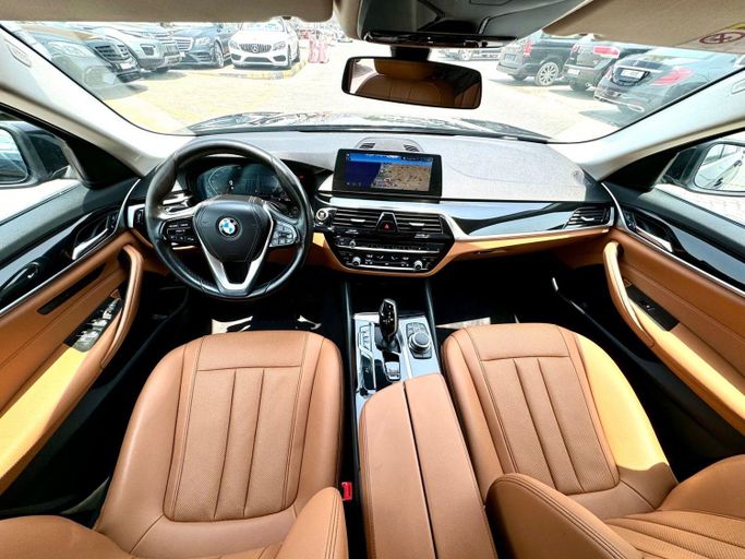 Used BMW 5 Series 520i VII (G30/G31) Facelift, 2.0 l, 2023 in Sharjah by DCB Cars, Black color. GCC Specs | AUTO.AE