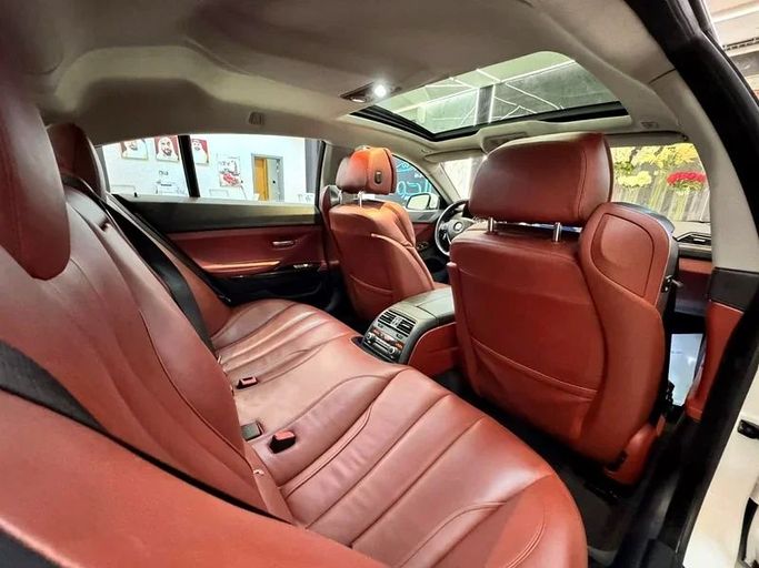 Подержанный BMW 6 Series 640i III (F06/F13/F12) Рестайлинг, 3.0 л, 2016 в Шардже от Ayoon Alhoot Motors Белый цвет. GCC | AUTO.AE