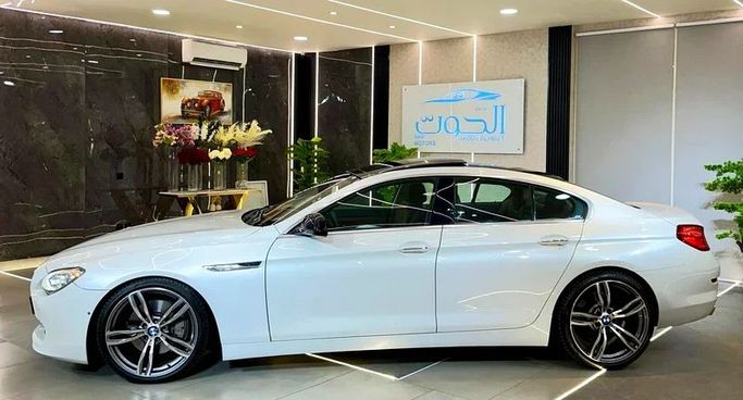 Подержанный BMW 6 Series 650i xDrive III (F06/F13/F12), 4.4 л, 2014 в Шардже от Ayoon Alhoot Motors Белый цвет. GCC | AUTO.AE