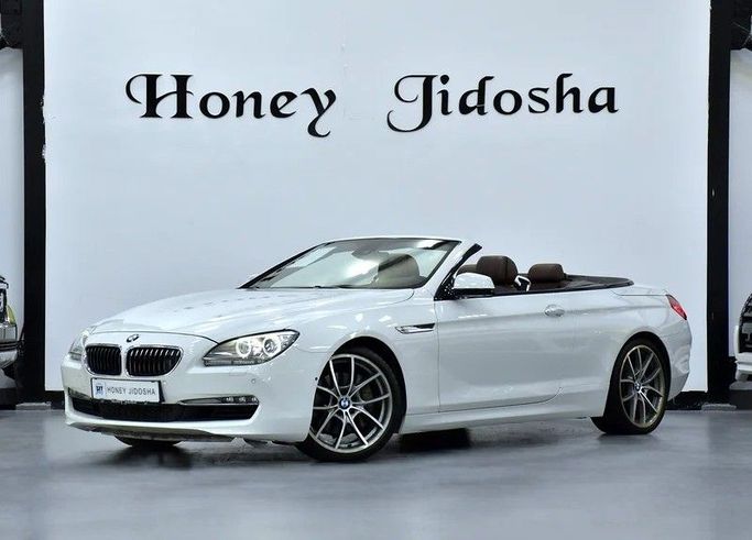 Подержанный BMW 6 Series 650i III (F06/F13/F12), 4.4 л, 2011 в Шардже от Honey Gidosha Used Cars Tr. Белый цвет.  | AUTO.AE