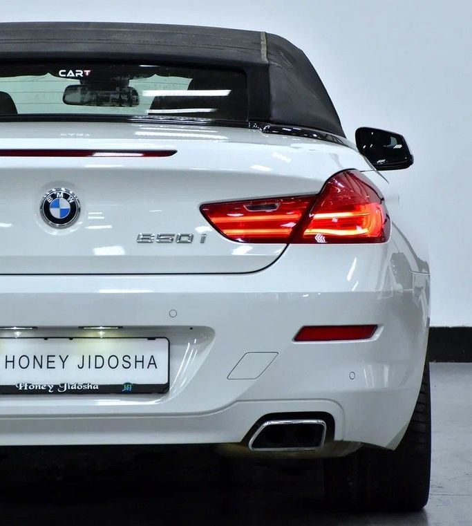 Подержанный BMW 6 Series 650i III (F06/F13/F12), 4.4 л, 2011 в Шардже от Honey Gidosha Used Cars Tr. Белый цвет.  | AUTO.AE