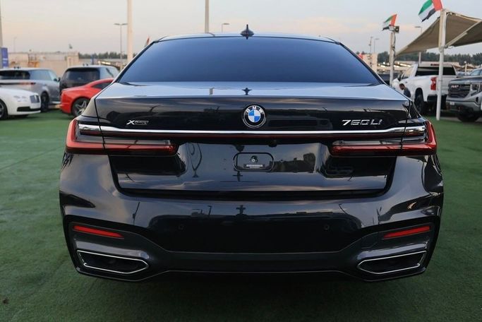 Подержанный BMW 7 Series 750Li xDrive VI (G11/G12) Рестайлинг, 4.4 л, 2022 в Шардже от Al Bake Used Cars Черный цвет.  | AUTO.AE