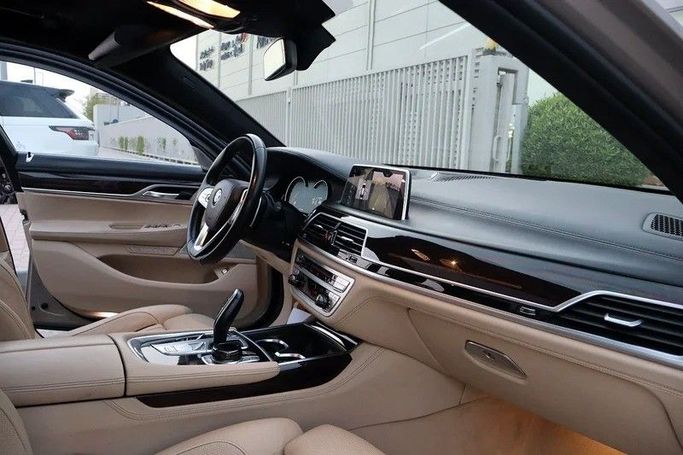 Used BMW 7 Series 740Li VI (G11/G12), 3.0 l, 2016 in Sharjah by Al Rukin Al Saudi, Golden color. GCC Specs | AUTO.AE