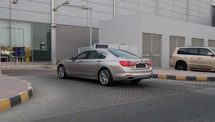 Used BMW 7 Series 740Li VI (G11/G12), 3.0 l, 2016 in Sharjah by Al Rukin Al Saudi, Golden color. GCC Specs | AUTO.AE