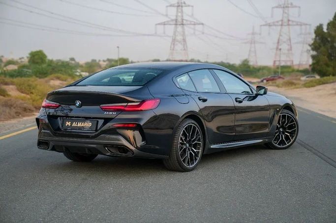 Подержанный BMW 8 Series 840i II (G14/G15/G16) Рестайлинг, 3.0 л, 2024 в Шардже от Almarid Motors Черный цвет. GCC | AUTO.AE