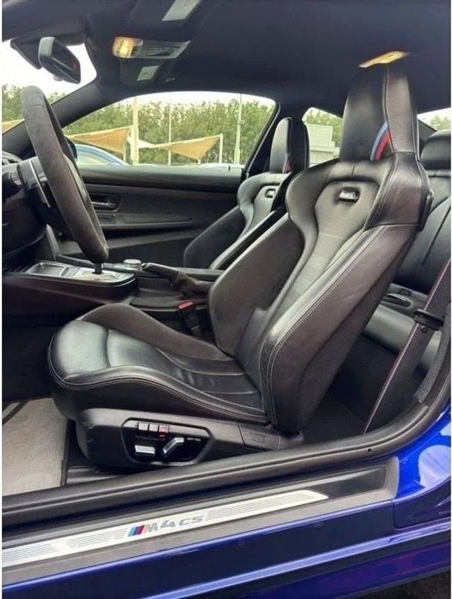Used BMW M4 CS F82/F83 Facelift, 3.0 l, 2020 in Sharjah by Noor Al Seyoh Used Cars, Blue color. American Specs | AUTO.AE