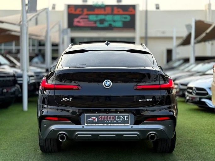 Used BMW X4 M I (F98), 3.0 l, 2021 in Sharjah by Speed Line Used Cars, Black color. GCC Specs | AUTO.AE