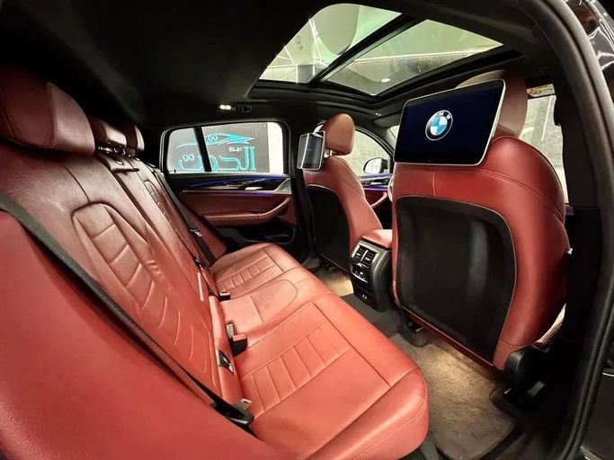 Used BMW X4 M40i II (G02) Facelift, 3.0 l, 2022 in Sharjah by Ayoon Alhoot Motors, Black color. GCC Specs | AUTO.AE