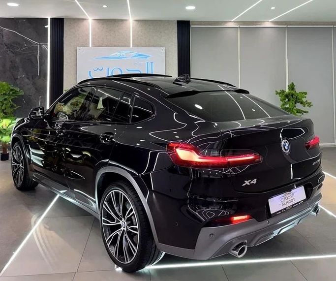 Used BMW X4 M40i II (G02) Facelift, 3.0 l, 2022 in Sharjah by Ayoon Alhoot Motors, Black color. GCC Specs | AUTO.AE