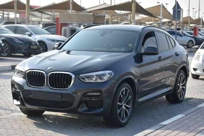 Подержанный BMW X4 30i II (G02), 2.0 л, 2021 в Шардже от Alfaris Used Cars Черный цвет. GCC | AUTO.AE