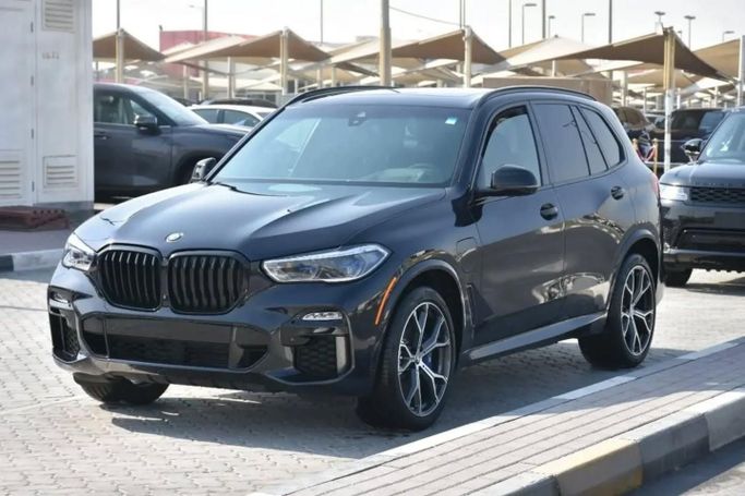Used BMW X5 45e IV (G05/G18), 3.0 l, 2021 in Sharjah by Alfaris Used Cars, Black color. Other | AUTO.AE