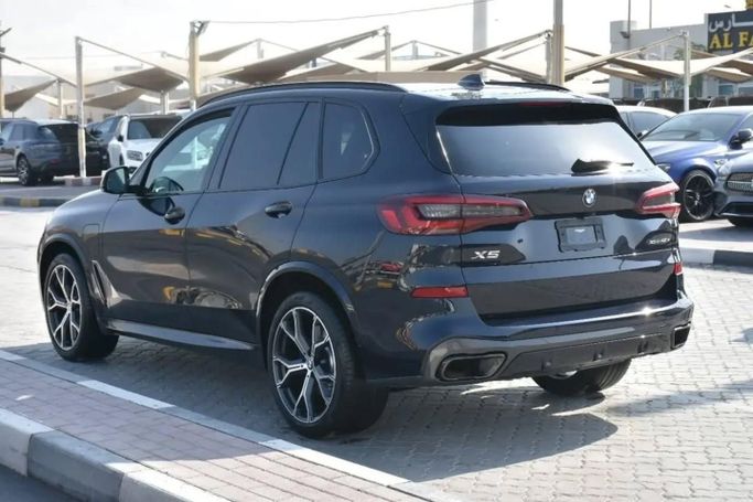Used BMW X5 45e IV (G05/G18), 3.0 l, 2021 in Sharjah by Alfaris Used Cars, Black color. Other | AUTO.AE