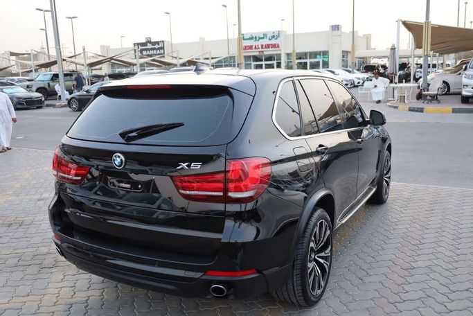 Подержанный BMW X5 35i III (F15), 3.0 л, 2015 в Шардже от OMC Used Cars Черный цвет. GCC | AUTO.AE