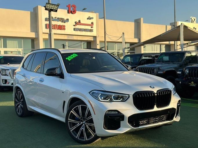 Used BMW X5 M50i IV (G05/G18), 4.4 l, 2020 in Sharjah by Badar Used Cars, White color.  | AUTO.AE