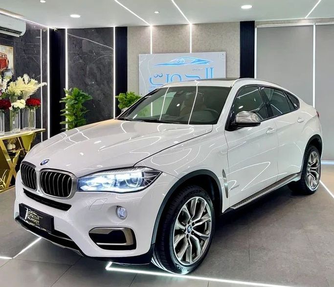 Used BMW X6 50i II (F16), 4.4 l, 2016 in Sharjah by Ayoon Alhoot Motors, White color. GCC Specs | AUTO.AE