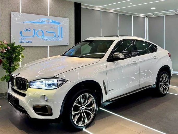 Used BMW X6 50i II (F16), 4.4 l, 2016 in Sharjah by Ayoon Alhoot Motors, White color. GCC Specs | AUTO.AE