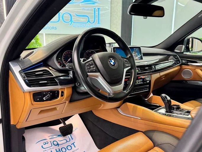 Used BMW X6 50i II (F16), 4.4 l, 2016 in Sharjah by Ayoon Alhoot Motors, White color. GCC Specs | AUTO.AE