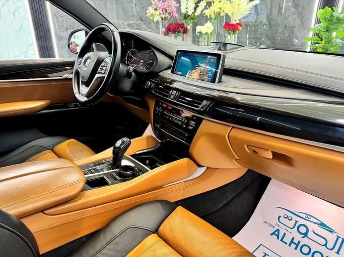 Used BMW X6 50i II (F16), 4.4 l, 2016 in Sharjah by Ayoon Alhoot Motors, White color. GCC Specs | AUTO.AE