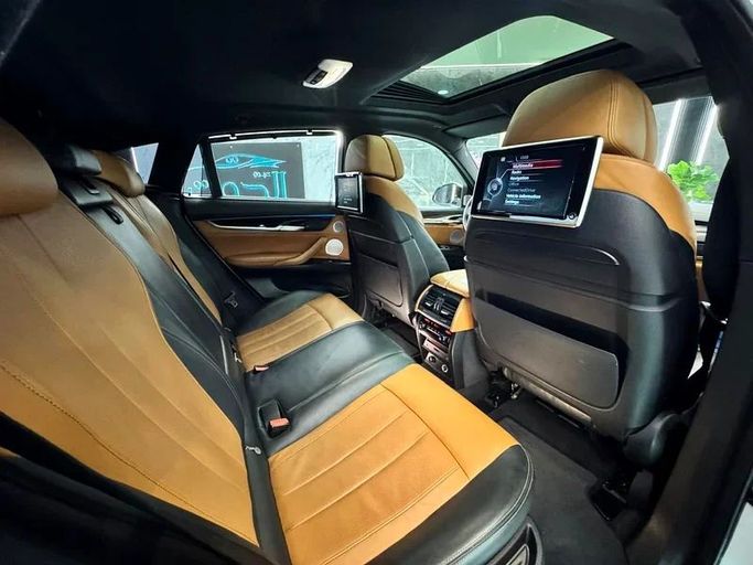 Used BMW X6 50i II (F16), 4.4 l, 2016 in Sharjah by Ayoon Alhoot Motors, White color. GCC Specs | AUTO.AE