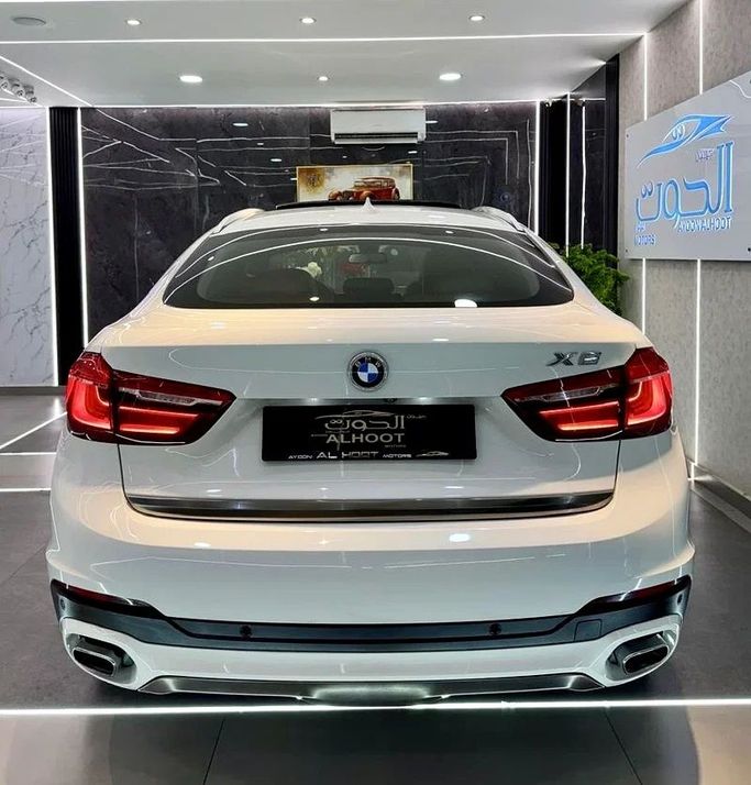 Used BMW X6 50i II (F16), 4.4 l, 2016 in Sharjah by Ayoon Alhoot Motors, White color. GCC Specs | AUTO.AE
