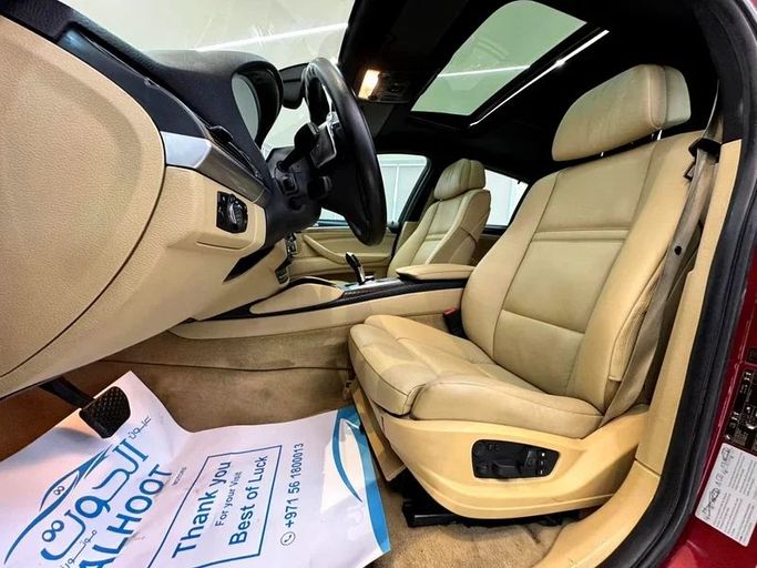 Подержанный BMW X6 35i I (E71), 3.0 л, 2011 в Шардже от Ayoon Alhoot Motors Красный цвет. GCC | AUTO.AE