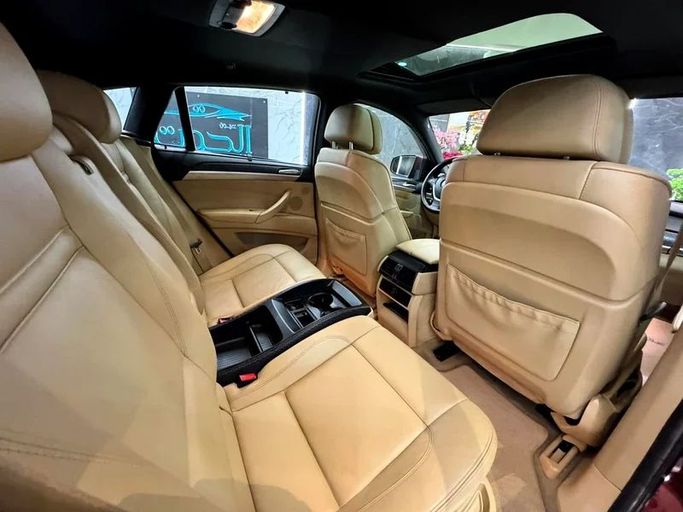 Подержанный BMW X6 35i I (E71), 3.0 л, 2011 в Шардже от Ayoon Alhoot Motors Красный цвет. GCC | AUTO.AE