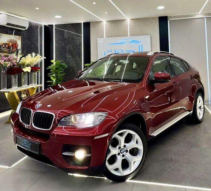 Подержанный BMW X6 35i I (E71), 3.0 л, 2011 в Шардже от Ayoon Alhoot Motors Красный цвет. GCC | AUTO.AE