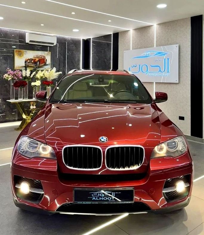 Подержанный BMW X6 35i I (E71), 3.0 л, 2011 в Шардже от Ayoon Alhoot Motors Красный цвет. GCC | AUTO.AE