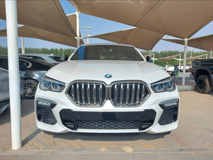 Used BMW X6 40i III (G06), 3.0 l, 2020 in Sharjah by MK Cars, White color. American Specs | AUTO.AE
